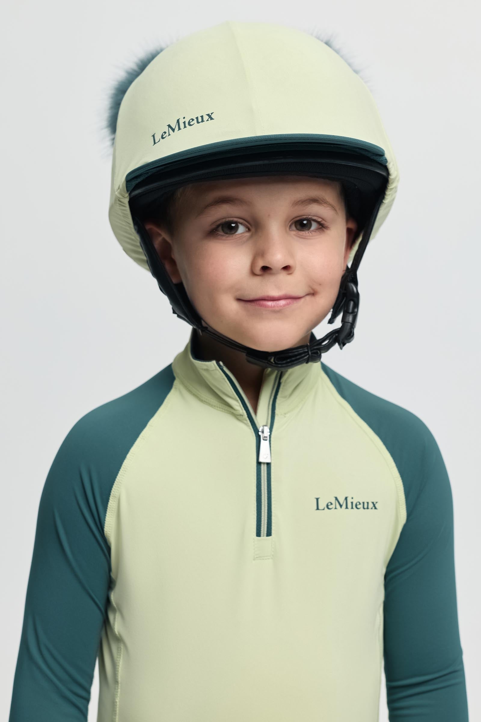LeMieux Mini copricasco con doppio pompon Abbigliamento per bambini
