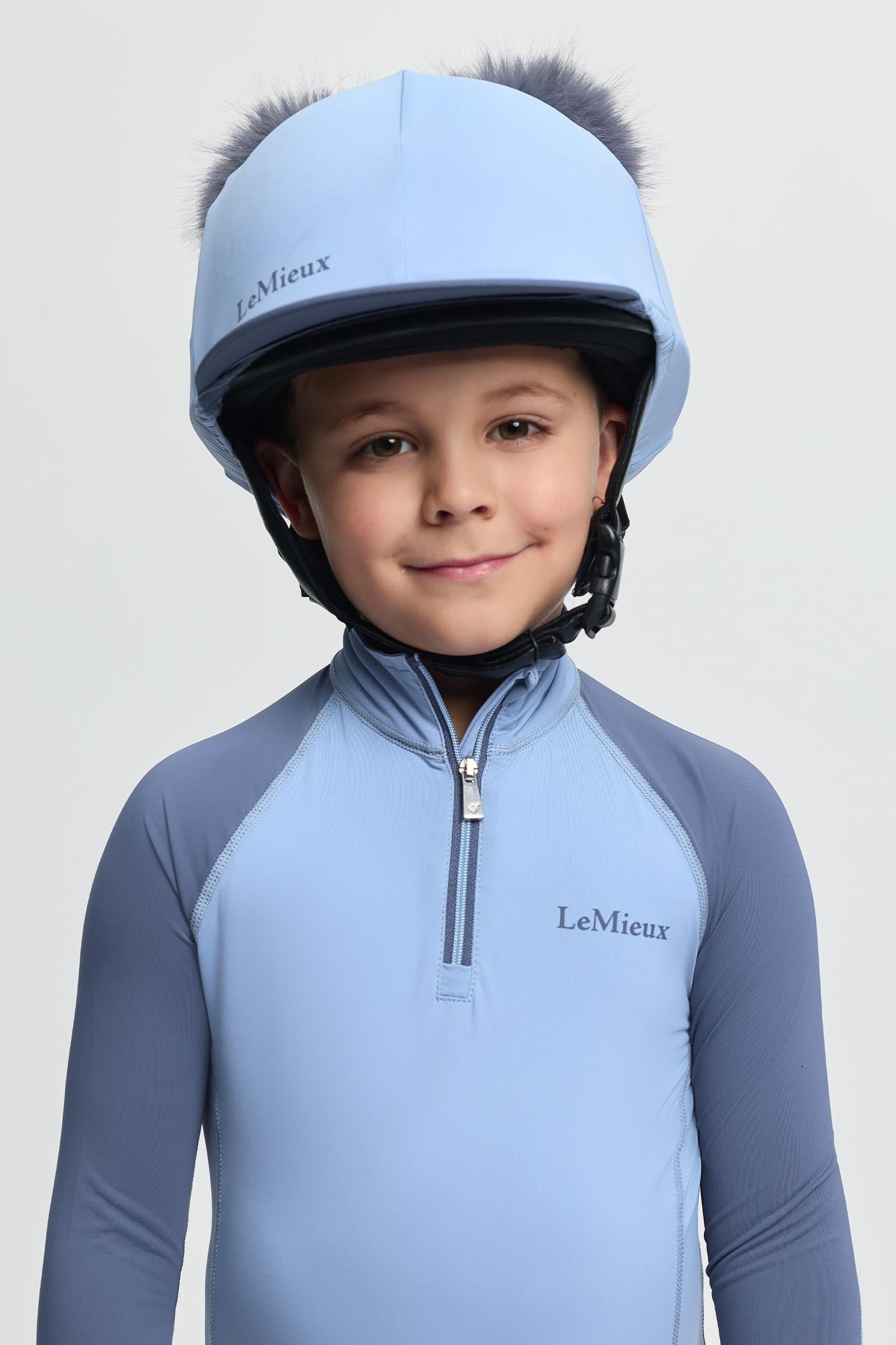 LeMieux Mini copricasco con doppio pompon Abbigliamento per bambini